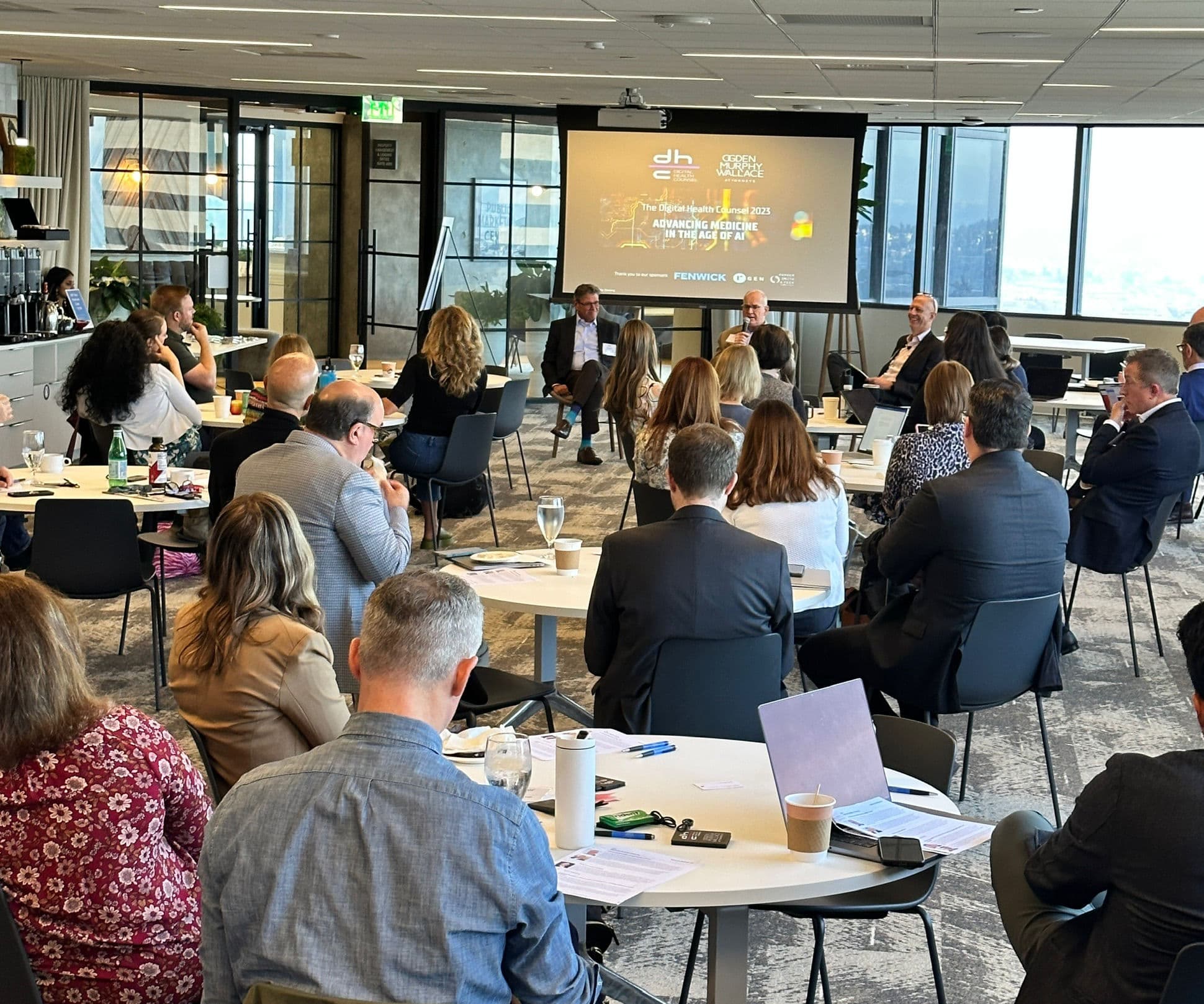 DHC 2025 summit — attendees and panelists during a session